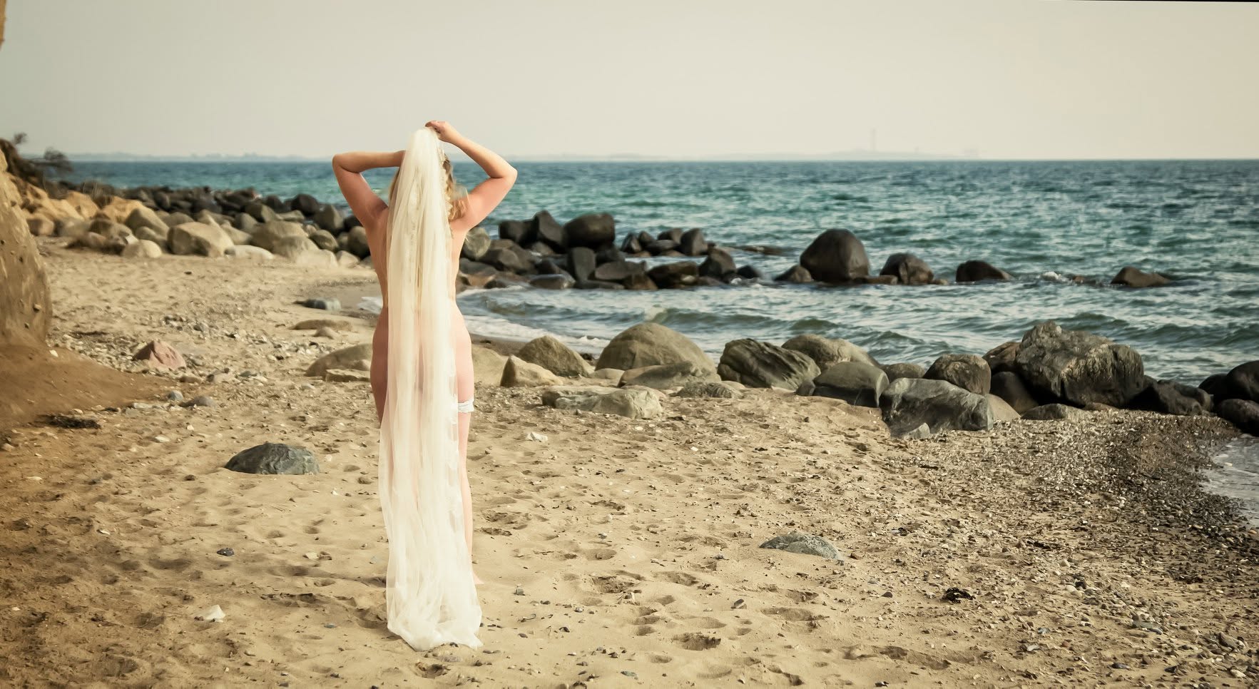 Portræt ved havet fotograferet af Henriette Stage
